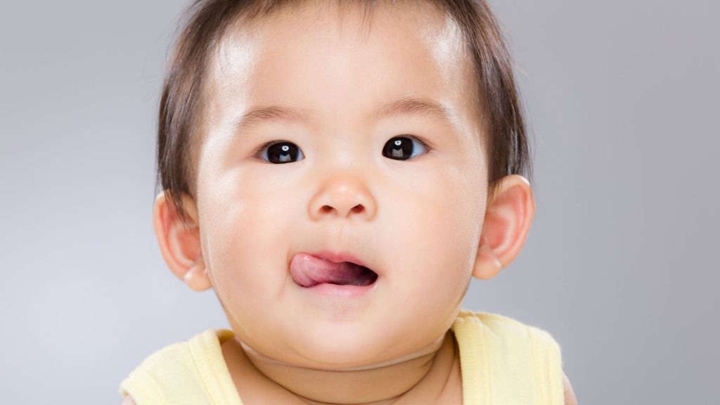 When to start feeding solid foods - Baby showing interest in foods